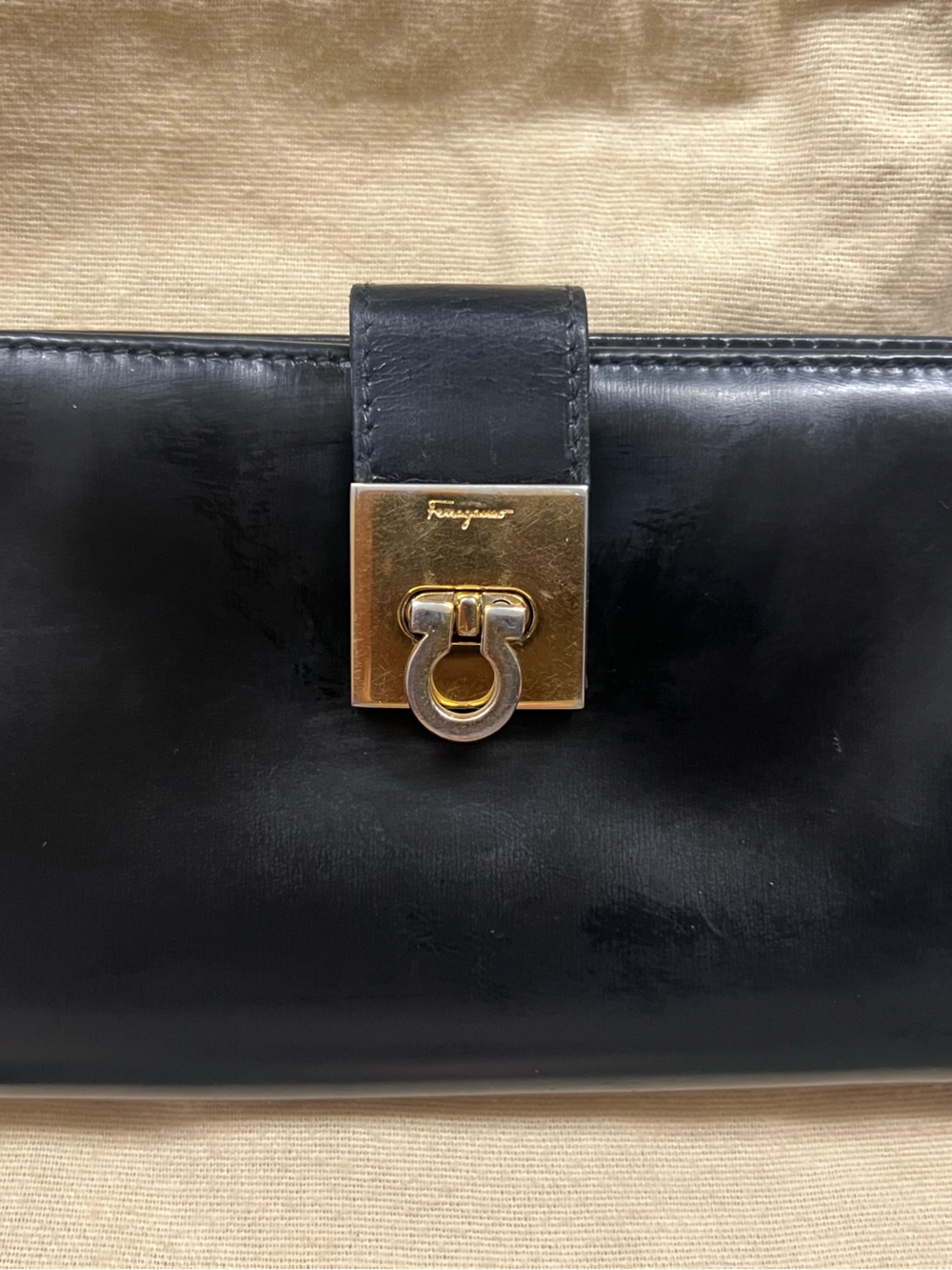 Salvatore Ferragamo Black Patent Leather Wallet with Gold Gancini Accent